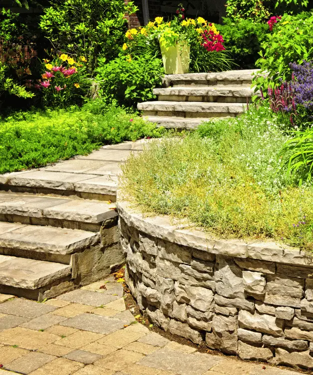 Stone stairs with retaining wall and flowers