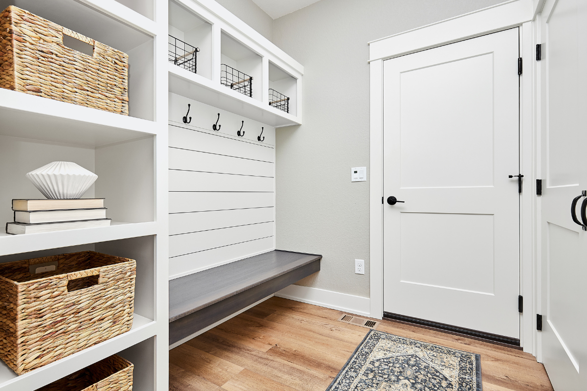 Luxury mudroom with organizer baskets